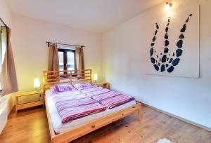 Postel nebo postele na pokoji v ubytování Apartmány a chata MONTANUS