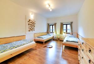 Postel nebo postele na pokoji v ubytování Apartmány a chata MONTANUS