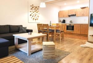 Kuchyň nebo kuchyňský kout v ubytování Apartmány a chata MONTANUS