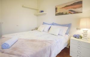 Postel nebo postele na pokoji v ubytování Villa Lago Dei Cigni