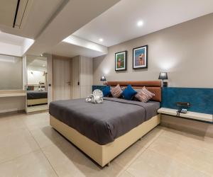 Katil atau katil-katil dalam bilik di Hotel Landmark By Pai