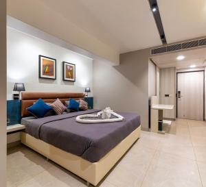 Katil atau katil-katil dalam bilik di Hotel Landmark By Pai