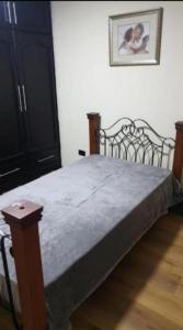 Cama o camas de una habitación en Ecualodge IV. LOVELY 3 BEDROOM APARTMENT