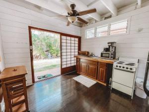 a kitchen with a stove and a counter top at Cute Guest Suite in Kailua with AC!!! in Kailua
