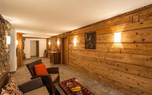 TV a/nebo společenská místnost v ubytování Gästehaus Bergland
