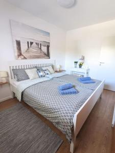 Postel nebo postele na pokoji v ubytování Ferienwohnung für 4 Gäste in Grömitz