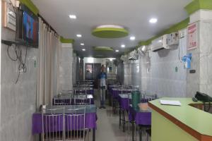 Ресторант или друго място за хранене в Goroomgo Om Sai Residency Bhubaneswar