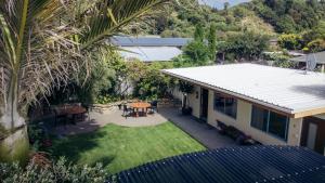 an aerial view of a house with a yard at Futuna Rocks Motel in Kaikoura
