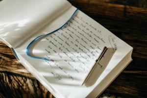 a letter sitting on top of a piece of paper at Seaside 43 in Sankt Peter-Ording