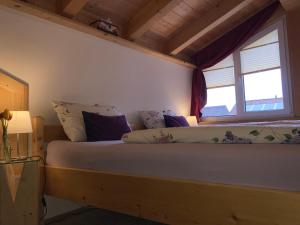 En eller flere senge i et værelse på s‘Fleckerl