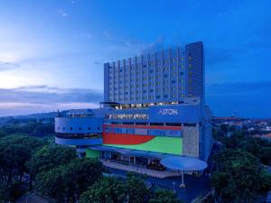 a building with a rainbow on the side of it at ASTON Gresik Hotel & Conference Center in Gresik
