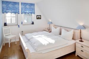 Postel nebo postele na pokoji v ubytování Landhaus Kranichblick