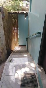 a walkway leading to a door to a building at CBHaus in El Nido