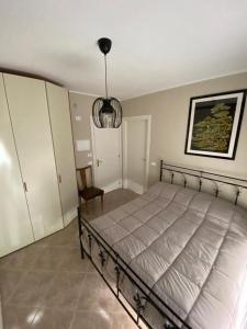 A bed or beds in a room at Residenze BepiLù