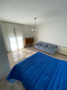 A bed or beds in a room at Residenze BepiLù