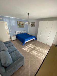 A bed or beds in a room at Residenze BepiLù