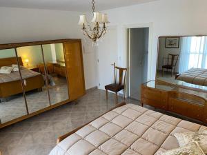 A bed or beds in a room at Residenze BepiLù