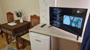 TV a/nebo společenská místnost v ubytování Vila Korani