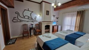 Postel nebo postele na pokoji v ubytování Vila Korani
