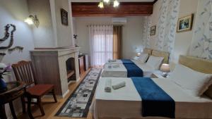 Postel nebo postele na pokoji v ubytování Vila Korani