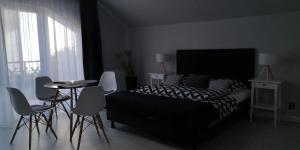 Posteľ alebo postele v izbe v ubytovaní Villa Basia