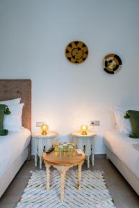 Riad Dar Blanche & Spa客房内的一张或多张床位
