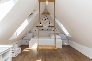 Posteľ alebo postele v izbe v ubytovaní Apartamenty Polana Sywarne Zakopane