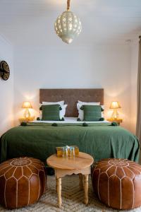 Riad Dar Blanche & Spa客房内的一张或多张床位