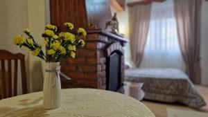 Postel nebo postele na pokoji v ubytování Vila Korani