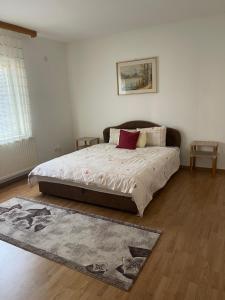 Ένα ή περισσότερα κρεβάτια σε δωμάτιο στο Apartment Rea Ilidža