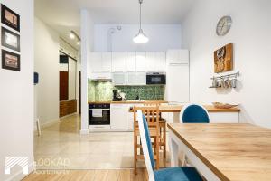 Kuchyň nebo kuchyňský kout v ubytování Loft Morski by LookAp
