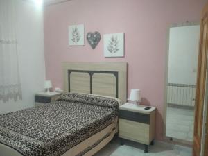 เตียงในห้องที่ Casa Hostal Olga - Castilla y León