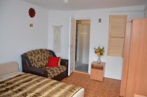 Voodi või voodid majutusasutuse Orchidea Apartman toas