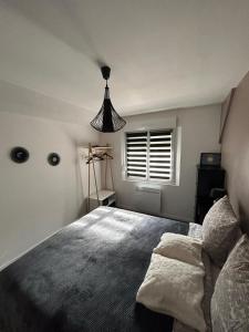 Cama ou camas em um quarto em Epernevasion