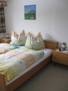 Postel nebo postele na pokoji v ubytování Haus Steinlechner