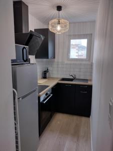 Η κουζίνα ή μικρή κουζίνα στο Appartement avec vue mer