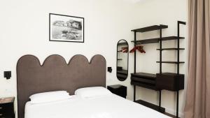 Postel nebo postele na pokoji v ubytování Spartahouse