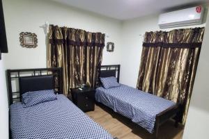En eller flere senge i et værelse på Hermosa y amplia casa muy céntrica!!