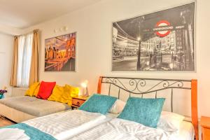 Posteľ alebo postele v izbe v ubytovaní Central Apartments