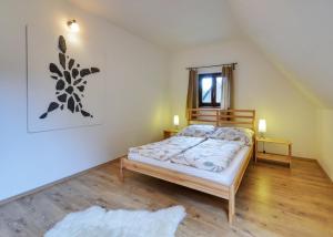 Postel nebo postele na pokoji v ubytování Apartmány a chata MONTANUS