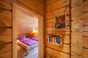 Postel nebo postele na pokoji v ubytování Chalet zum Salamander