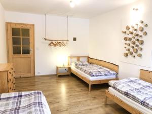 Postel nebo postele na pokoji v ubytování Apartmány a chata MONTANUS