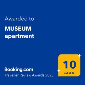 a yellow sign with the text wanted to museum appointment at MUSEUM apartment in Volos
