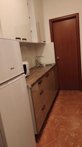 Kuchyň nebo kuchyňský kout v ubytování Good Inn