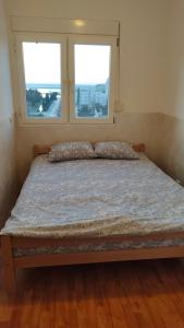 Postel nebo postele na pokoji v ubytování Good Inn