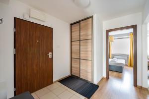 Posteľ alebo postele v izbe v ubytovaní MarOks Żółwia Apartment