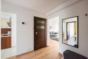 Posteľ alebo postele v izbe v ubytovaní MarOks Żółwia Apartment