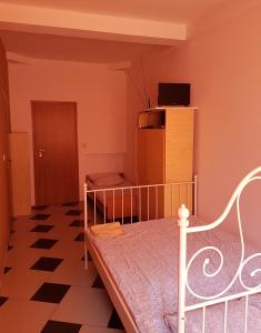 Postel nebo postele na pokoji v ubytování GuestHouse