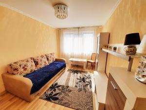 Posezení v ubytování Dzenu Apartment