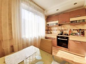 Kuchyň nebo kuchyňský kout v ubytování Dzenu Apartment